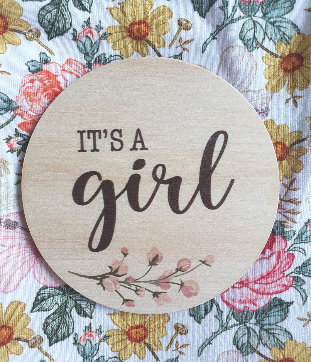 It's a girl wooden disc floral